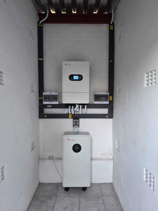 Felicity hybrid inverter and lithium battery, with AC and PV protection boards in steel trunking.