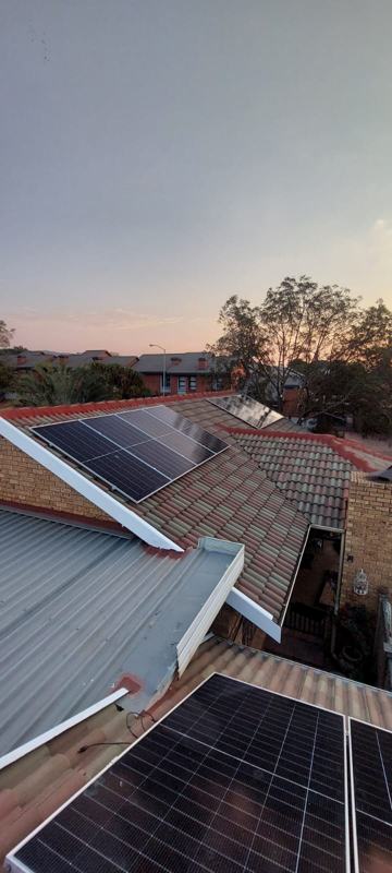 Panels split across several roof faces to use the available space.
